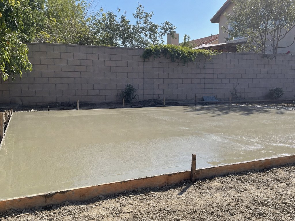 Freshly poured concrete slab for a garage in Stockton